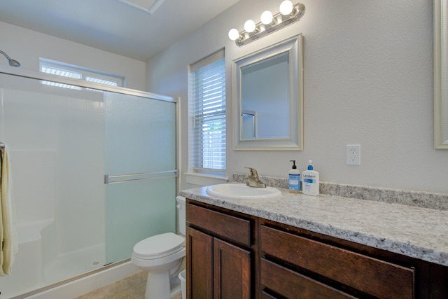 3503 Americana Way, Redding, CA 96003 - full bathroom featuring vanity, toilet, a stall shower, and plenty of natural light