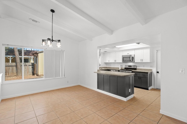 2633 Forest Ct, Redding, CA 96002 - kitchen with appliances with stainless steel finishes, white cabinets, a chandelier, light tile patterned floors, and a peninsula