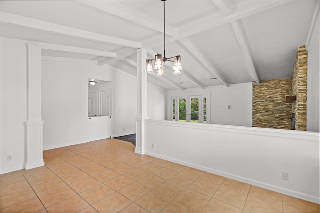 2633 Forest Ct, Redding, CA 96002 - empty room featuring light tile patterned floors, a chandelier, and decorative columns