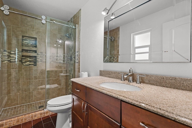 2633 Forest Ct, Redding, CA 96002 - bathroom featuring vanity, a stall shower, and a textured wall