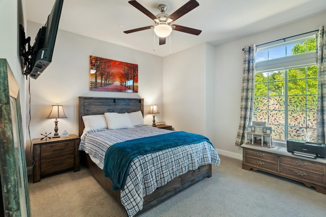 5538 Muir Peak Rd, Redding, CA 96002 - bedroom featuring light colored carpet, a ceiling fan, and baseboards
