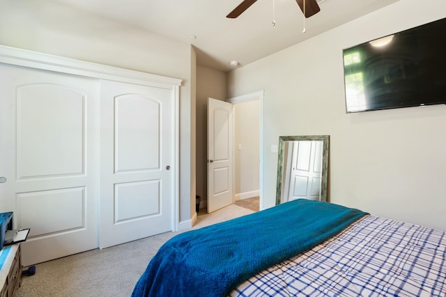 5538 Muir Peak Rd, Redding, CA 96002 - bedroom featuring a ceiling fan, a closet, and light colored carpet