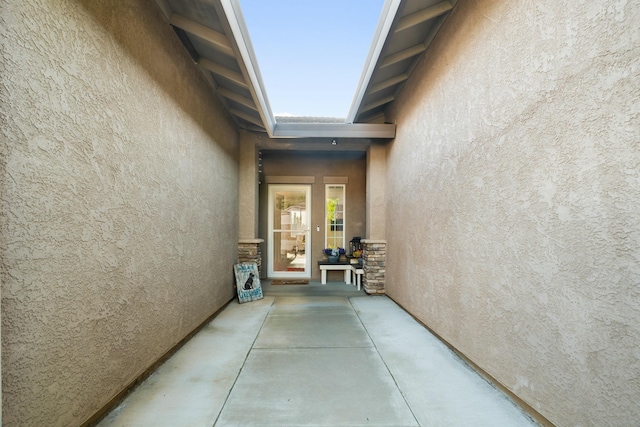 5538 Muir Peak Rd, Redding, CA 96002 - doorway to property featuring stucco siding and a patio area
