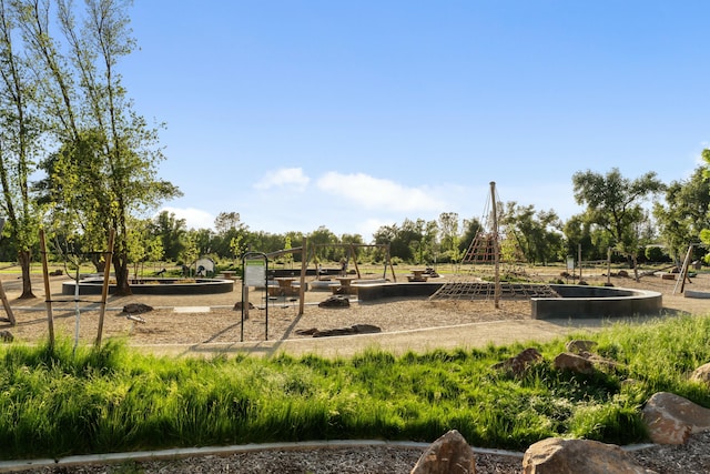 5538 Muir Peak Rd, Redding, CA 96002 - community play area featuring a vegetable garden