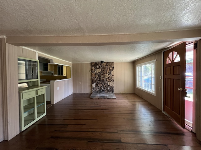 36770 Woods Ave, Burney, CA 96013 - foyer entrance with a textured ceiling, hardwood / wood-style floors, wood walls, and beam ceiling