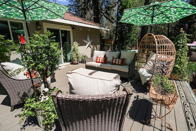 wooden deck with an outdoor hangout area