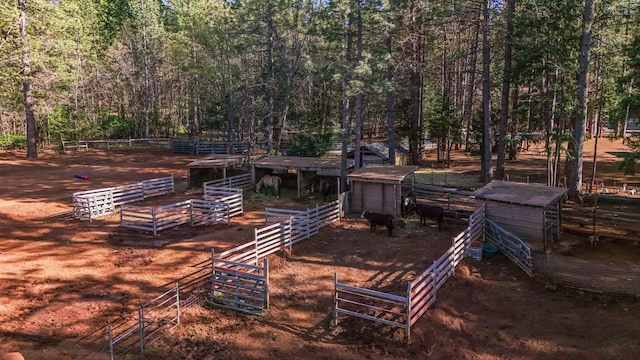 surrounding community featuring an outdoor structure and an exterior structure