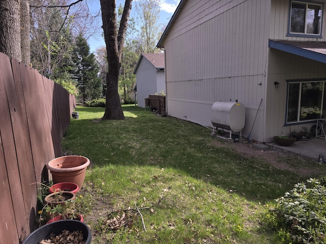 view of yard with heating fuel