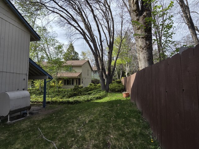 view of yard featuring heating fuel