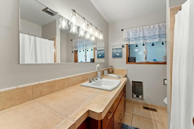 19817 Oak Knoll Dr, Lakehead, CA 96051 - bathroom with toilet, tile patterned flooring, visible vents, and vanity