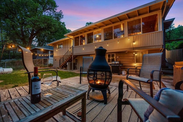 19817 Oak Knoll Dr, Lakehead, CA 96051 - exterior space with a fire pit, central AC unit, and stairway