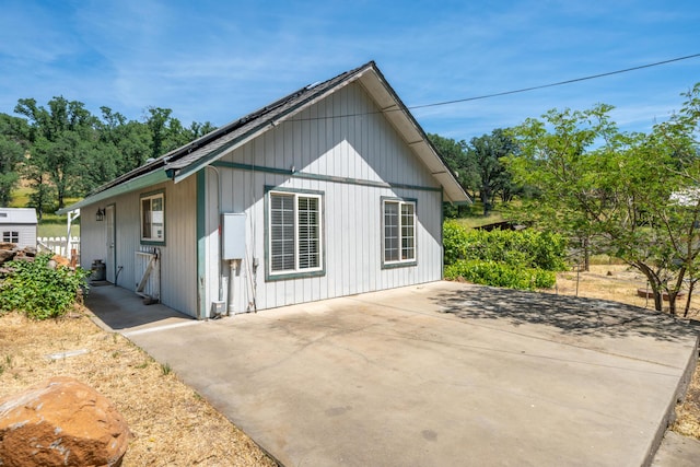 24294 Dersch Rd, Anderson, CA 96007 - view of property exterior featuring a patio and solar panels