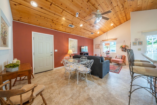 24294 Dersch Rd, Anderson, CA 96007 - living room featuring plenty of natural light, light colored carpet, wood ceiling, vaulted ceiling, and a ceiling fan