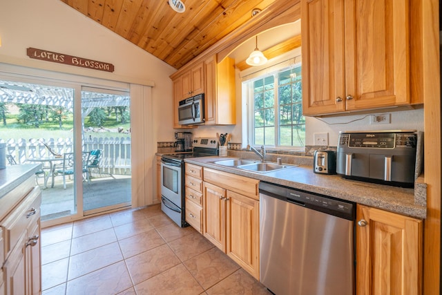 24294 Dersch Rd, Anderson, CA 96007 - kitchen with stainless steel appliances, a sink, vaulted ceiling, wood ceiling, and light tile patterned floors