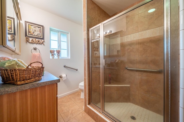 24294 Dersch Rd, Anderson, CA 96007 - full bath with toilet, a shower stall, baseboards, vanity, and tile patterned flooring