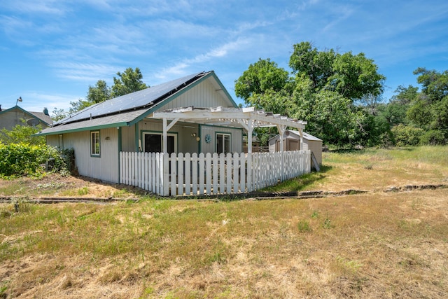 24294 Dersch Rd, Anderson, CA 96007 - bungalow-style home featuring roof mounted solar panels and a pergola
