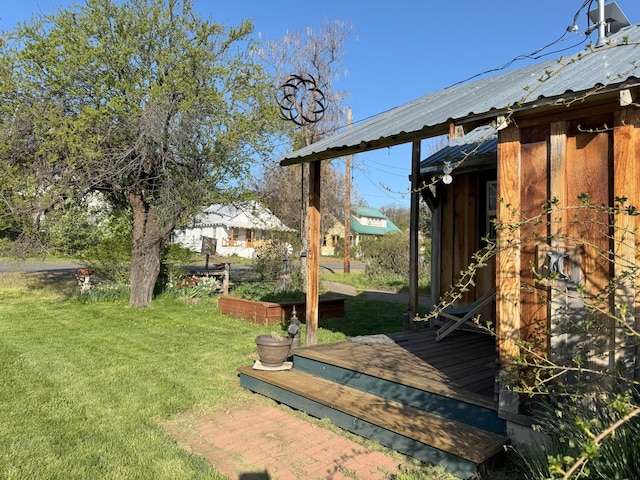 view of yard with a deck