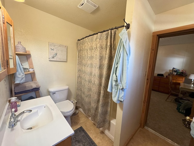 bathroom featuring visible vents, toilet, shower / bath combination with curtain, and vanity