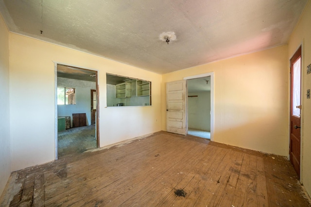 1390 Branstetter Ln, Redding, CA 96001 - unfurnished room featuring hardwood / wood-style flooring