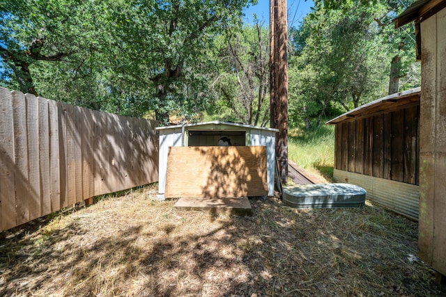 1390 Branstetter Ln, Redding, CA 96001 - view of yard with fence, an outbuilding, and a shed