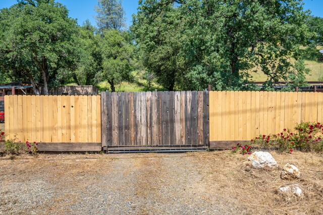 1390 Branstetter Ln, Redding, CA 96001 - view of gate featuring fence