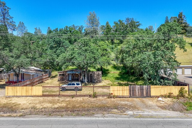 1390 Branstetter Ln, Redding, CA 96001 - view of front of home featuring fence