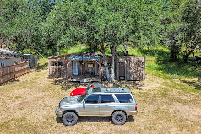 1390 Branstetter Ln, Redding, CA 96001 - view of front of home featuring fence and a front lawn