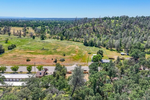 1390 Branstetter Ln, Redding, CA 96001 - aerial view with a wooded view