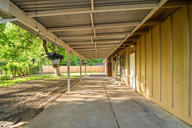 view of patio / terrace featuring fence
