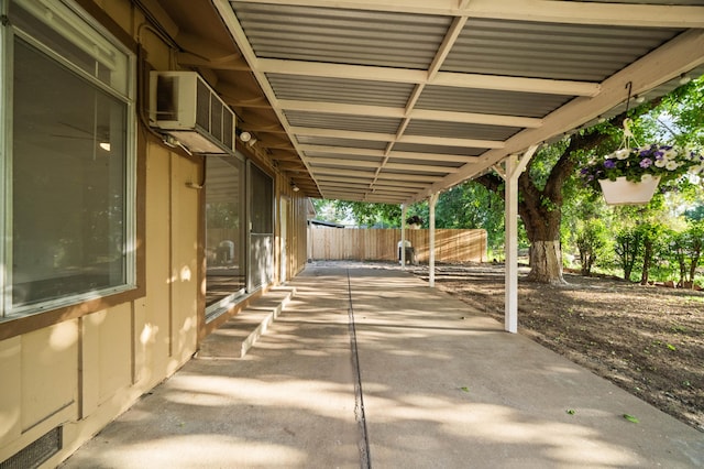 view of patio featuring fence