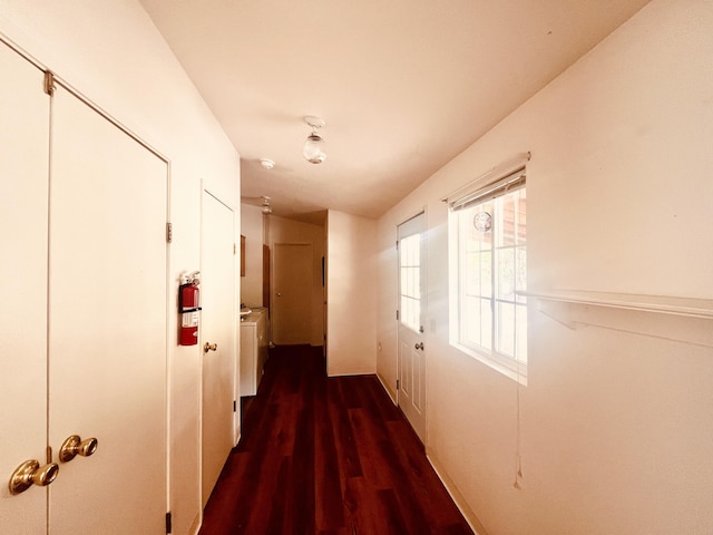 hall with wood finished floors