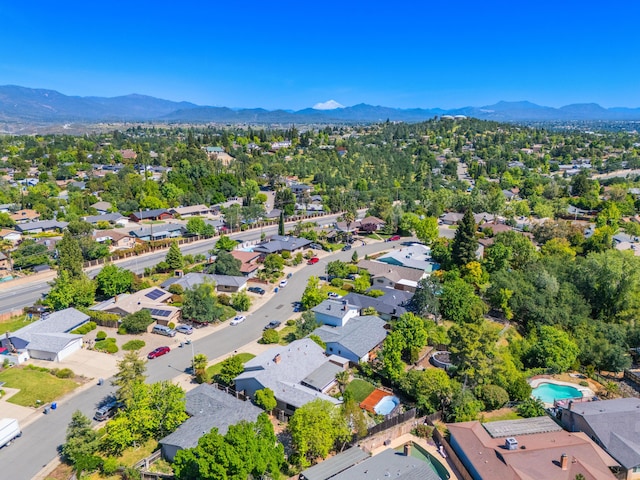 birds eye view of property with a residential view and a mountain view