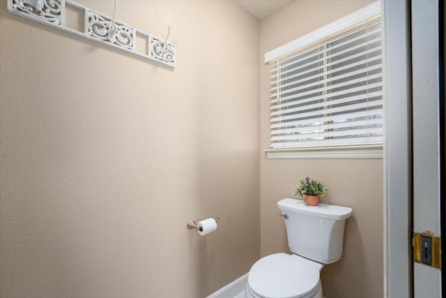 bathroom featuring toilet