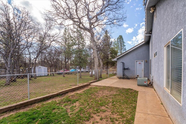view of yard with a patio and fence
