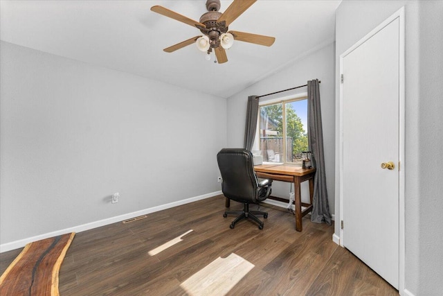 office featuring ceiling fan, baseboards, wood finished floors, lofted ceiling, and visible vents