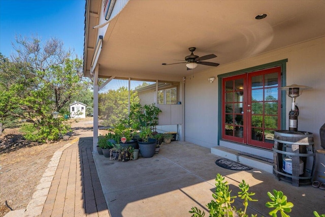 view of patio with french doors and a ceiling fan