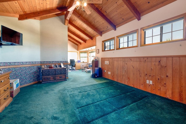 interior space featuring beam ceiling, high vaulted ceiling, wooden ceiling, a ceiling fan, and carpet