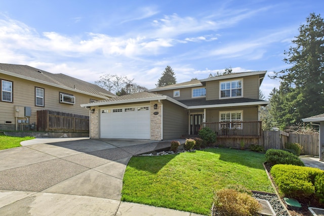view of front of property featuring fence, concrete driveway, a front lawn, and a garage