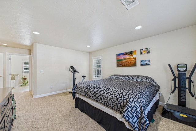 carpeted bedroom with visible vents, recessed lighting, and baseboards