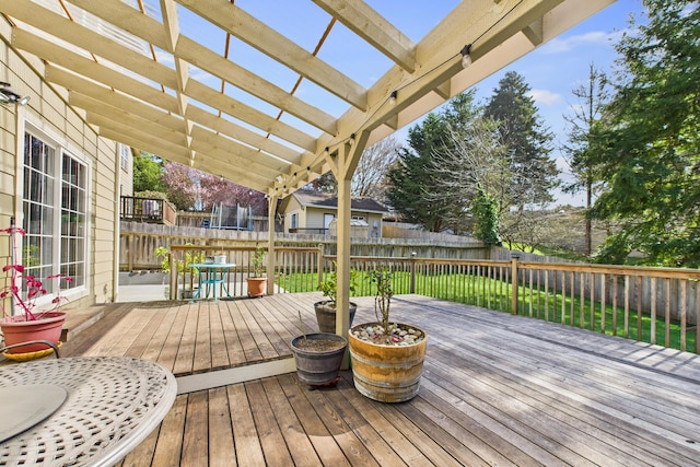 wooden terrace featuring outdoor dining space, a fenced backyard, and a pergola