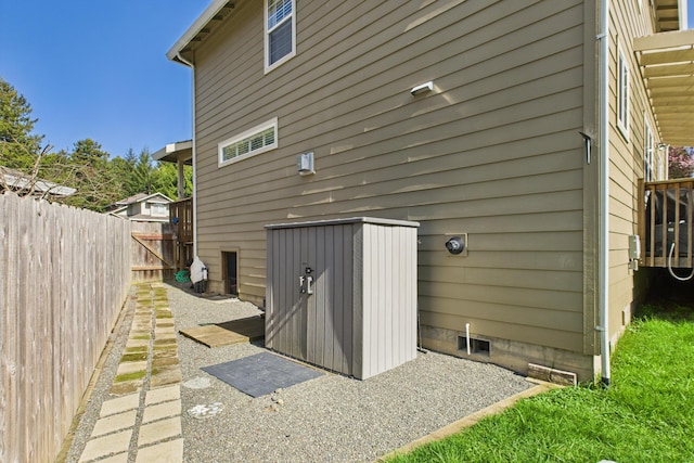 rear view of property with fence