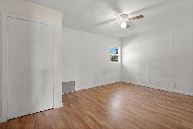 3169 Veda St, Redding, CA 96001 - empty room with light wood finished floors, ceiling fan, and baseboards