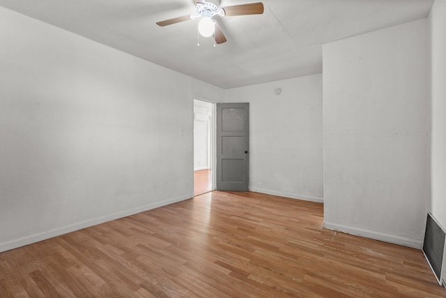 3169 Veda St, Redding, CA 96001 - empty room featuring light wood-style flooring, a ceiling fan, and baseboards