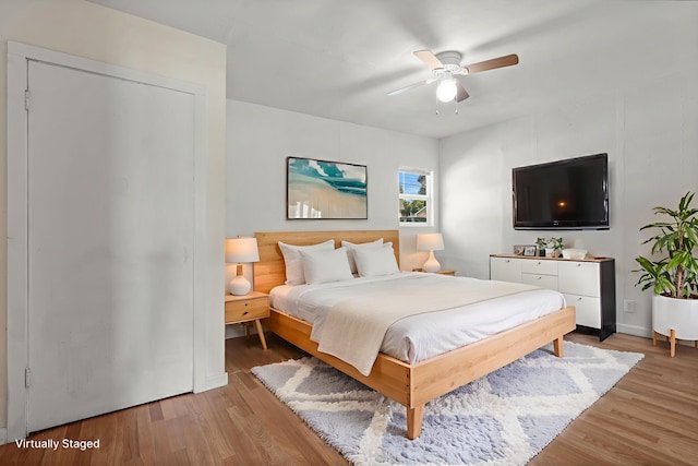 3169 Veda St, Redding, CA 96001 - bedroom with light wood finished floors and ceiling fan