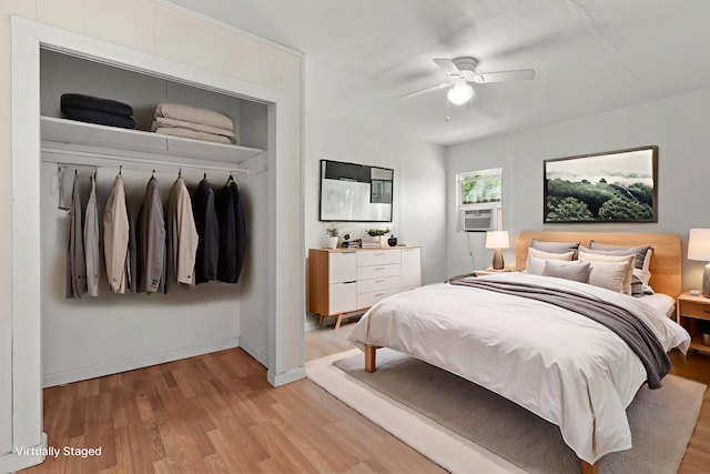 3169 Veda St, Redding, CA 96001 - bedroom with light wood-type flooring, cooling unit, a ceiling fan, and baseboards