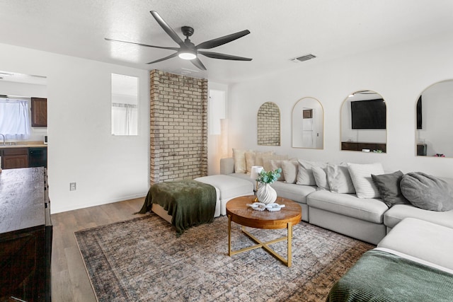 3150-3180 Franklin St, Anderson, CA 96007 - living room featuring a ceiling fan, visible vents, plenty of natural light, and dark wood finished floors