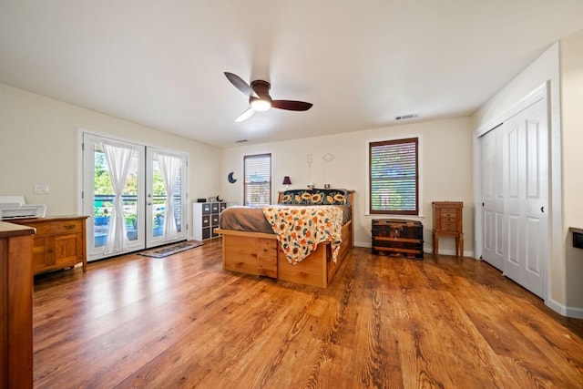 3301 Bridger Dr, Redding, CA 96002 - bedroom featuring access to exterior, light wood-style flooring, and ceiling fan