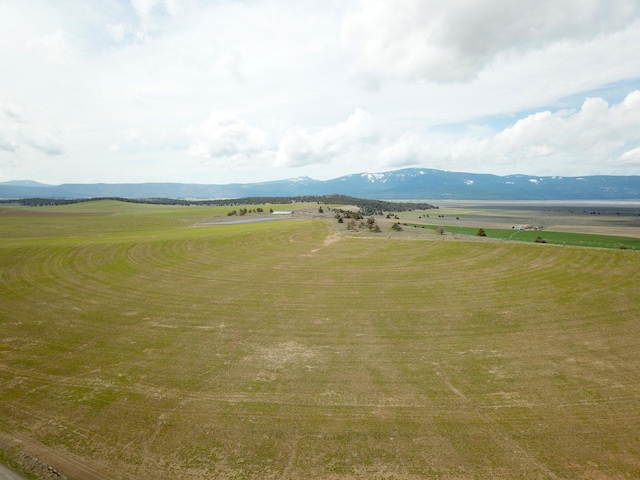 mountain view featuring a rural view