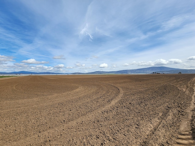 property view of mountains with a rural view