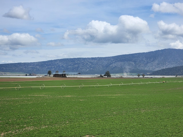 property view of mountains featuring a rural view
